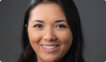 a close-up of a woman smiling