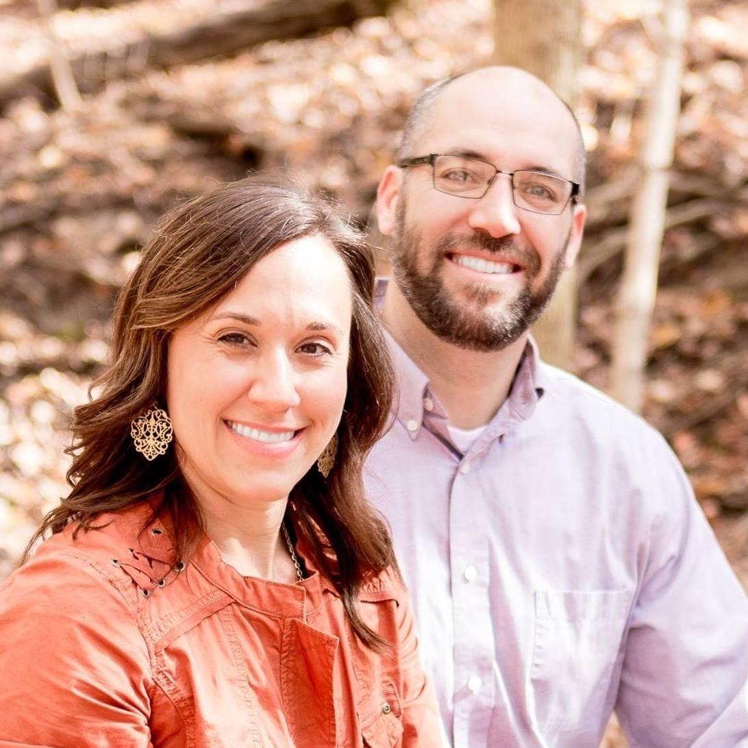 a man and woman smiling