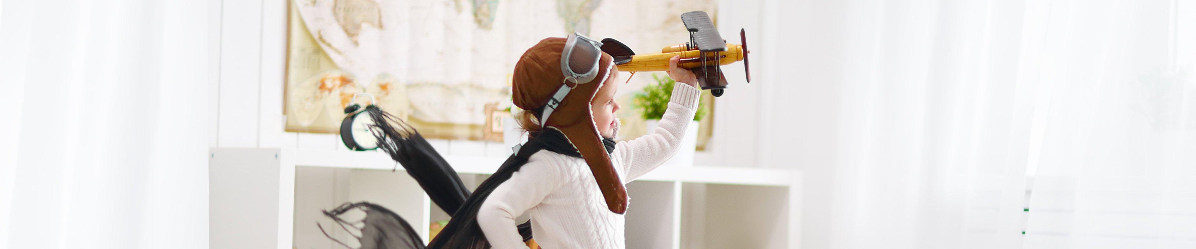 Image of a child playing in a living room.