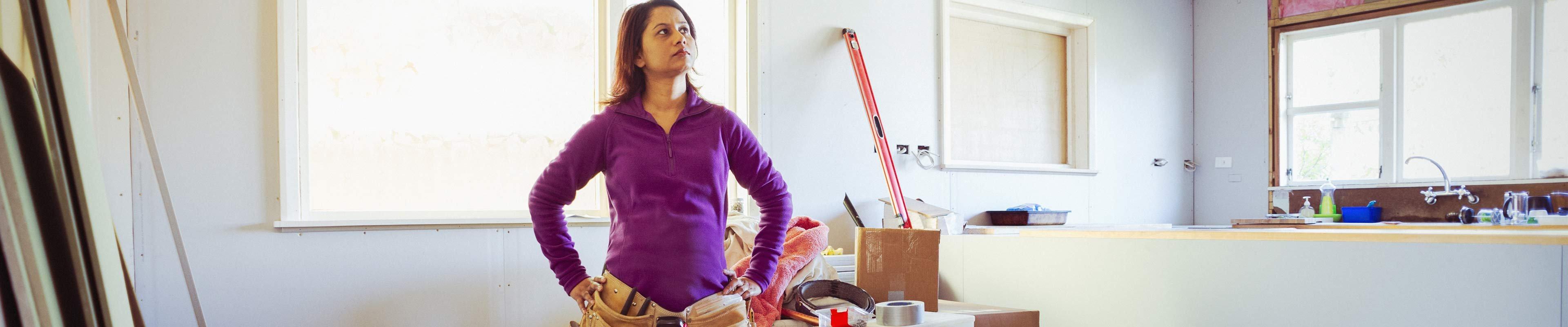 Woman working on a DIY project at home