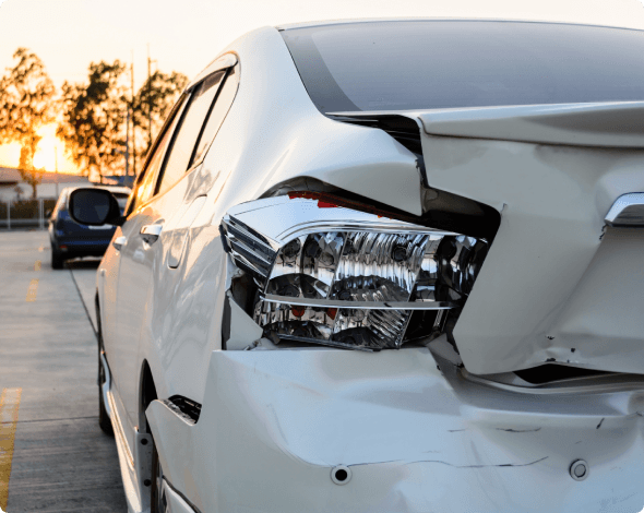 Back bumper damage to a car after an accident