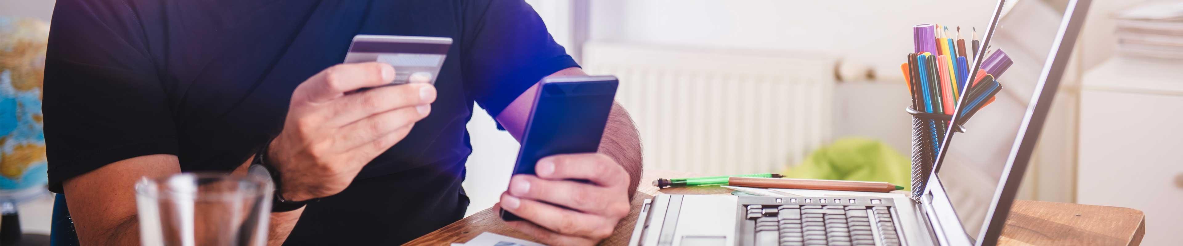 Man making a payment with a credit card