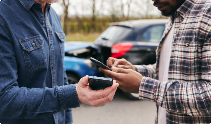 People exchanging info after a car accident