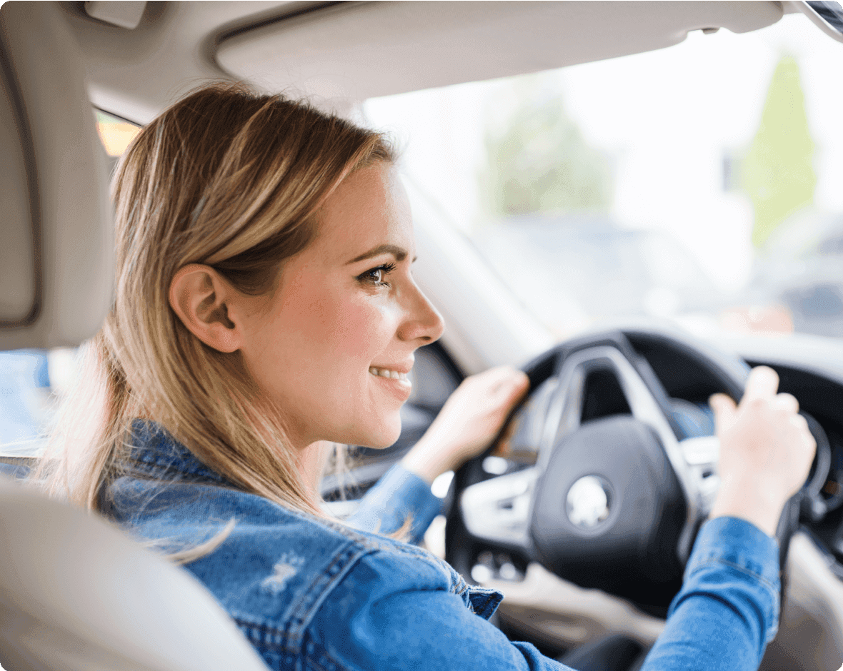 a woman driving a car