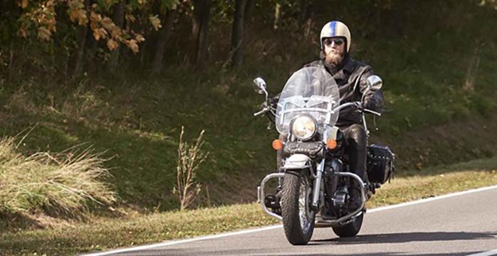 a man riding a motorcycle